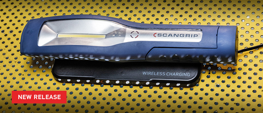New Release text over image of MAG PRO Wireless Inspection lmap on Inductive Charger, attached to perforated yellow moutning board