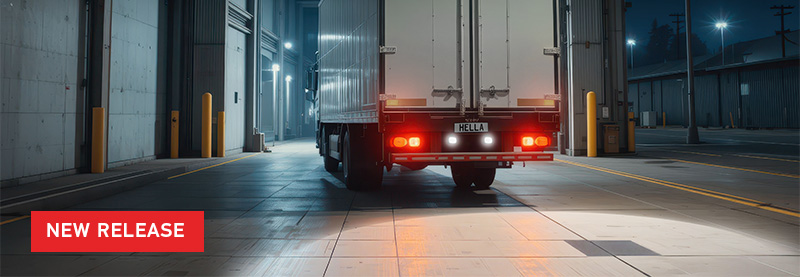 New Release text over Image of Truck shining a pool of light from rear facing reversing lights