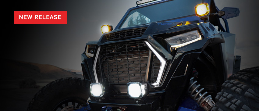 New Release text over image of off road buggy with White and Amber X-TREME driving lights