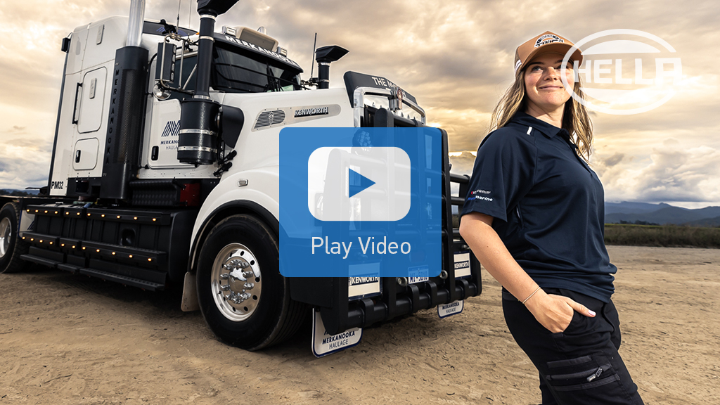 Antares lights on Truck with Female Truck Driver in forground