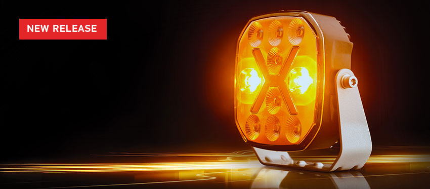 New Release text over image of orange lit SPF2200 Work Lamp